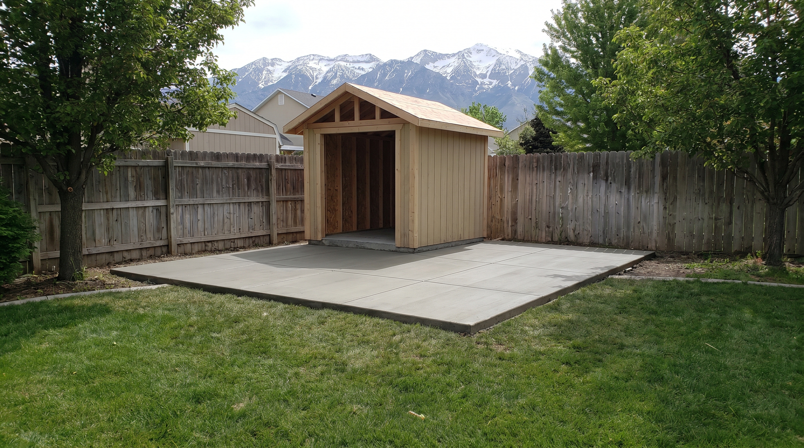 Concrete pad for a detached storage shed in a Utah backyard