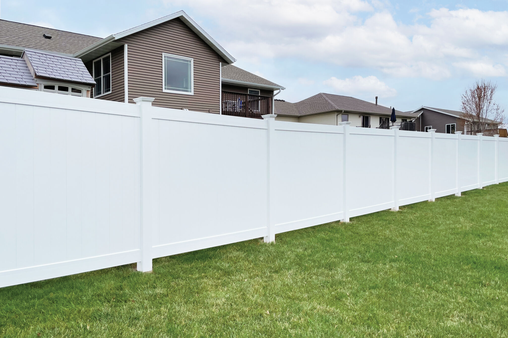 Vinyl fence and TREX deck installation